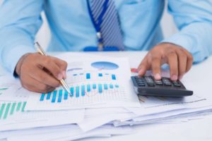 Financial manager analyzing charts and graphs