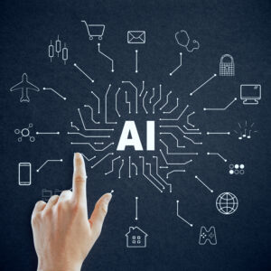 A hand points to the word "AI" at the center of a blackboard, surrounded by icons of industries and technologies, highlighting how small business AI is connecting sectors through innovation.